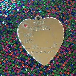 Sterling silver charm.